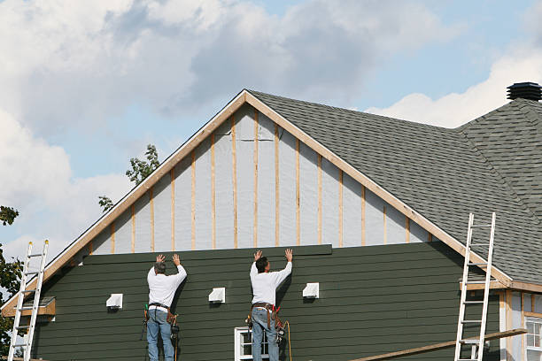 Professional Wood Siding technician working in Cortland, NY